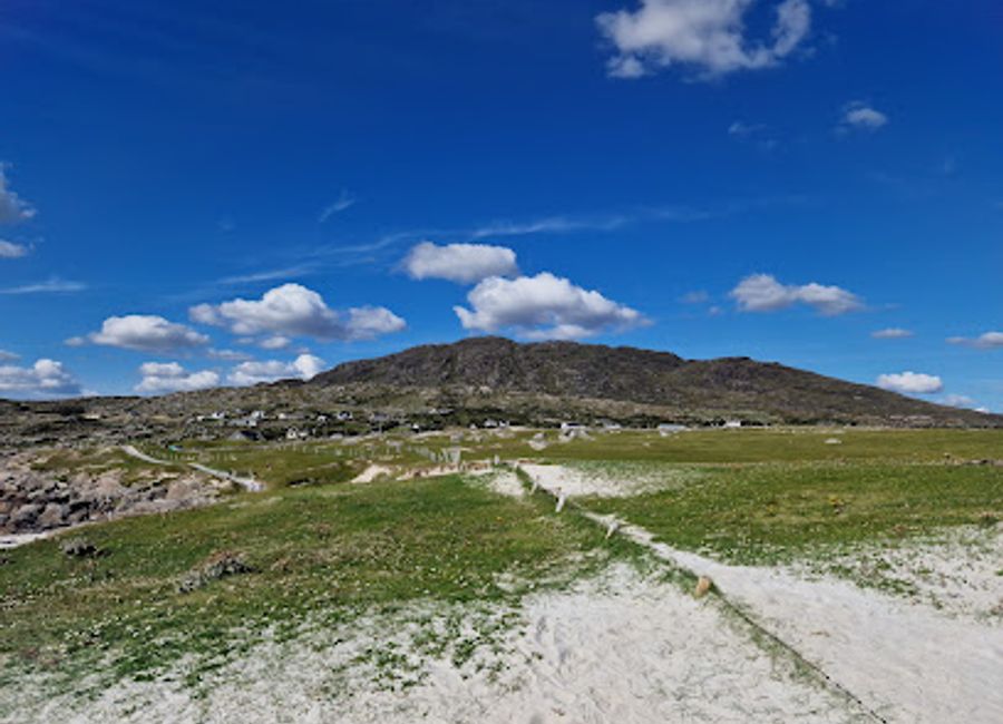 Experience the breathtaking beauty of Dog's Bay, a stunning public beach in Roundstone, Co. Galway, where golden sands meet crystal-clear waters.