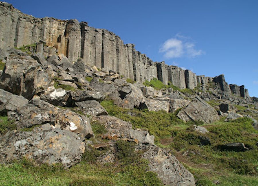 Explore the breathtaking Gerðuberg Cliffs, home to stunning basalt columns and diverse wildlife, a true Icelandic natural wonder.