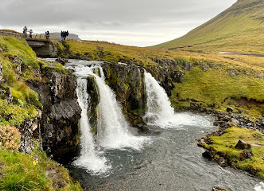 Explore the breathtaking Stone Bridge in Arnarstapi, a natural marvel that offers stunning ocean views and rich folklore.