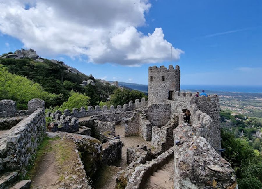 Immerse yourself in history and breathtaking views at Castelo dos Mouros, a stunning castle in Sintra that embodies Portugal's Moorish heritage.