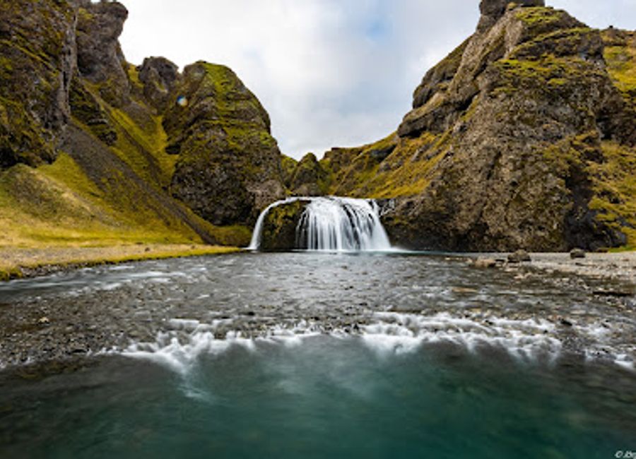 Experience the breathtaking beauty of Stjórnarfoss Waterfall, a serene oasis in Iceland that captivates nature lovers and adventurers alike.