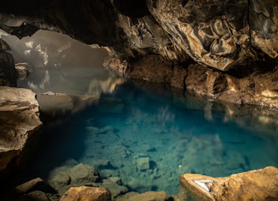 Explore Grjotagja, an enchanting fissure in Iceland with stunning hot springs and breathtaking volcanic landscapes perfect for relaxation and adventure.