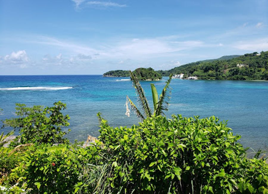 Experience the tranquil beauty of San San Beach, a serene escape in Jamaica with pristine sands, crystal-clear waters, and nearby attractions.