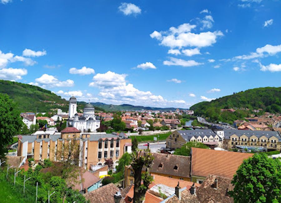 Explore The Covered Stairway in Sighișoara - a historical marvel connecting the lower town to the school, offering stunning views and a glimpse into Romania's medieval past.