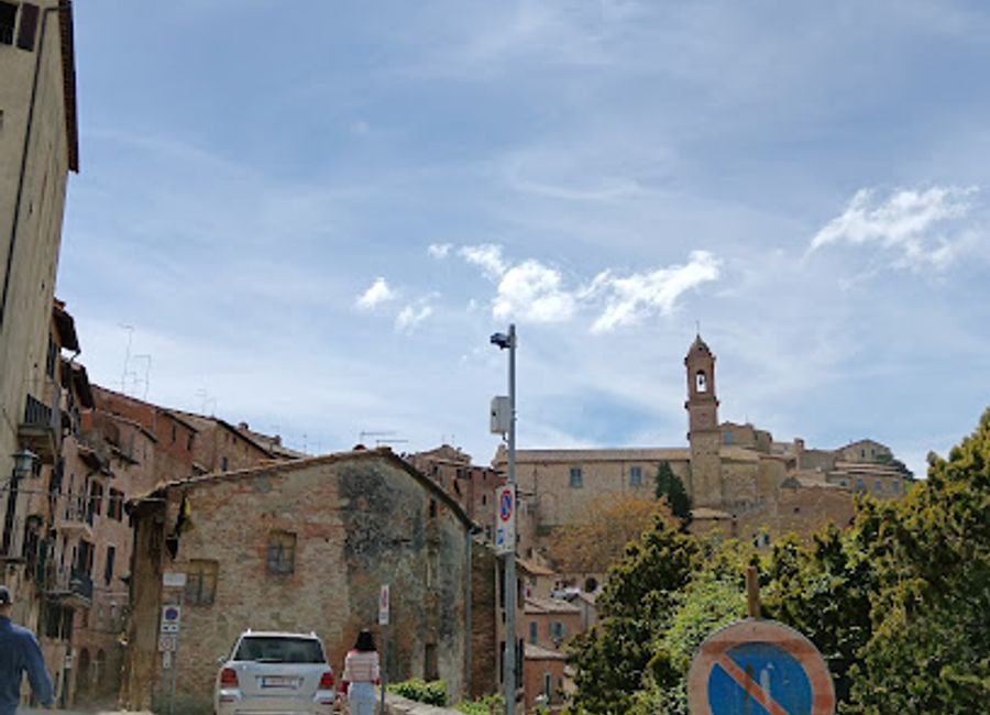 Explore the iconic Pulcinella Tower in Montepulciano, a stunning landmark showcasing Tuscany's rich heritage and breathtaking views.