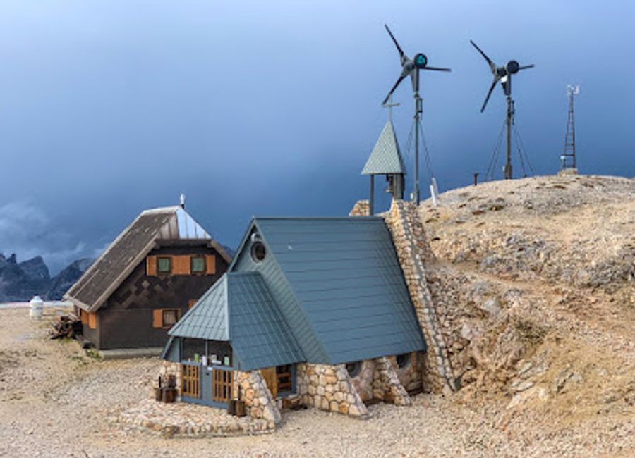 Discover the stunning Triglavski dom na Kredarici, a mountain cabin offering breathtaking views and cozy accommodations in the heart of the Julian Alps.