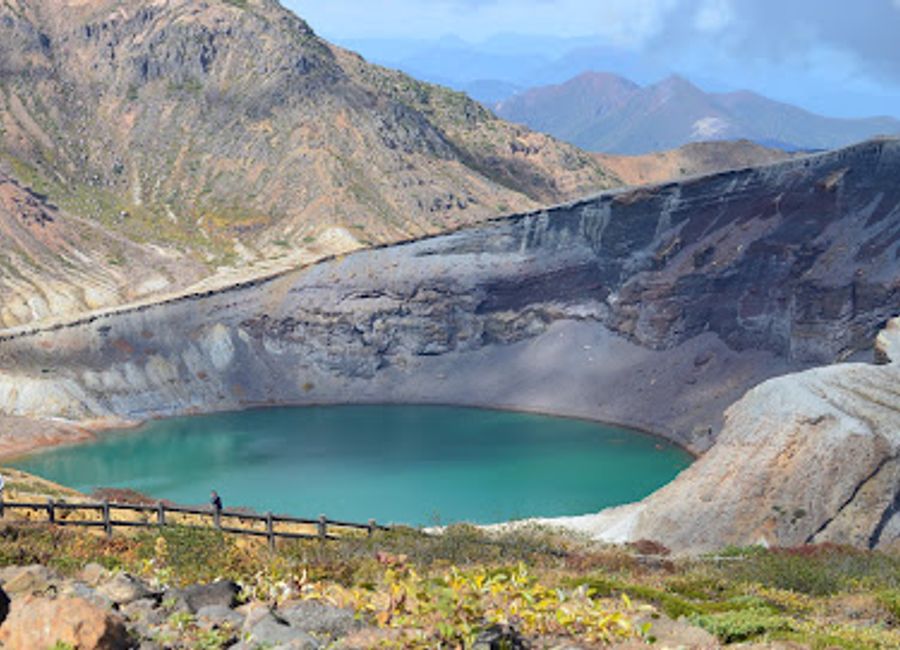 Experience the breathtaking beauty of Okama Crater in Miyagi Prefecture, where nature's artistry meets adventure in Japan's stunning landscapes.