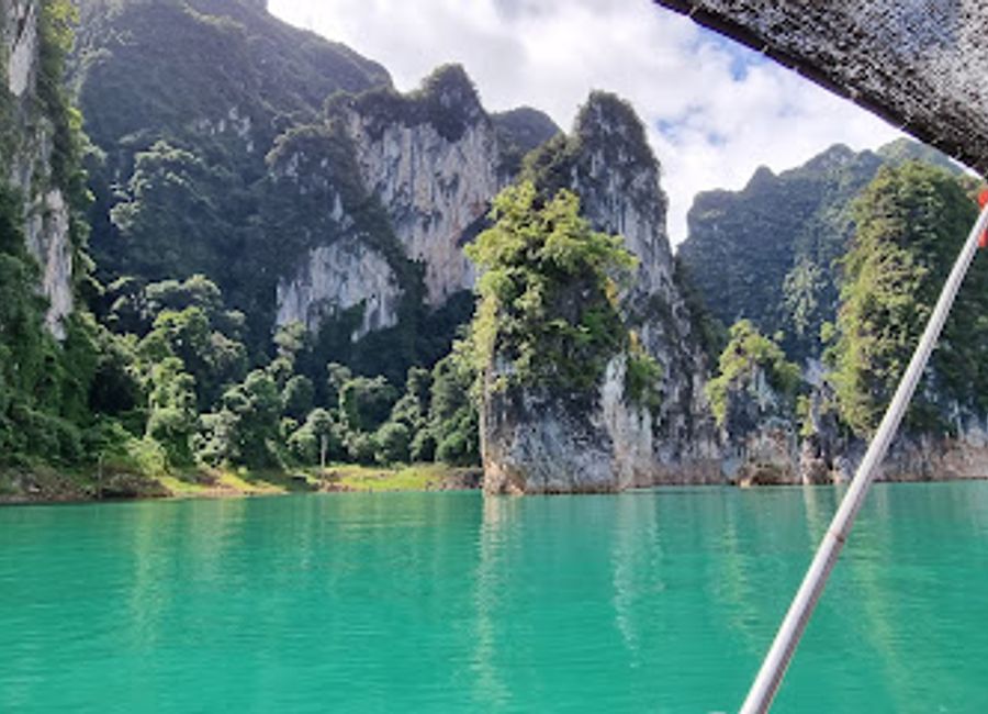 Experience the breathtaking beauty of Khao Sok Lake, a serene destination in Thailand's lush jungles, perfect for adventure and relaxation.