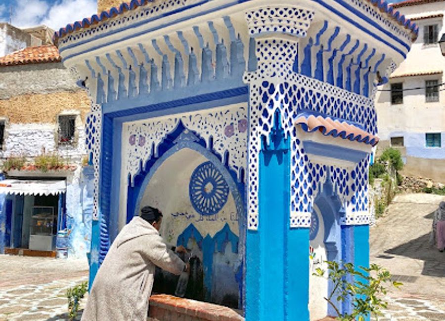 Explore the lively Place El Haouta in Chefchaouen, where culture, cuisine, and captivating blue architecture come together for an unforgettable experience.