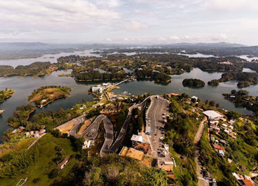 Experience breathtaking views and adventure at La Piedra del Peñol, a natural wonder in Guatapé, Colombia, perfect for all travelers.