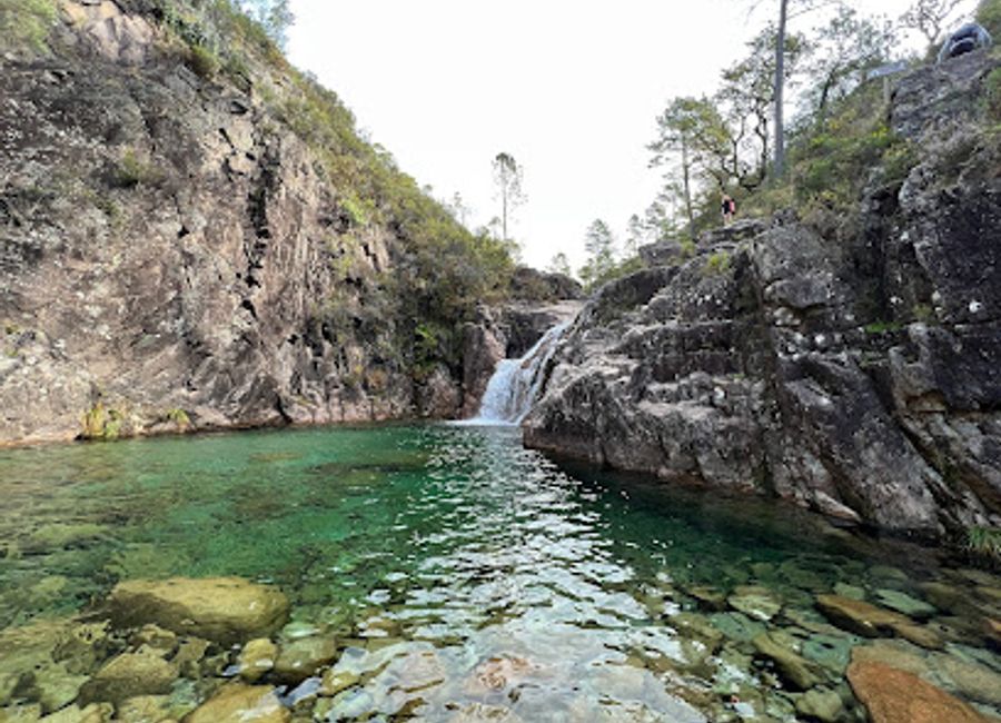 Discover the breathtaking beauty of Cascata da Portela do Homem, a must-visit waterfall in Portugal's Gerês National Park, perfect for nature lovers and adventure seekers.