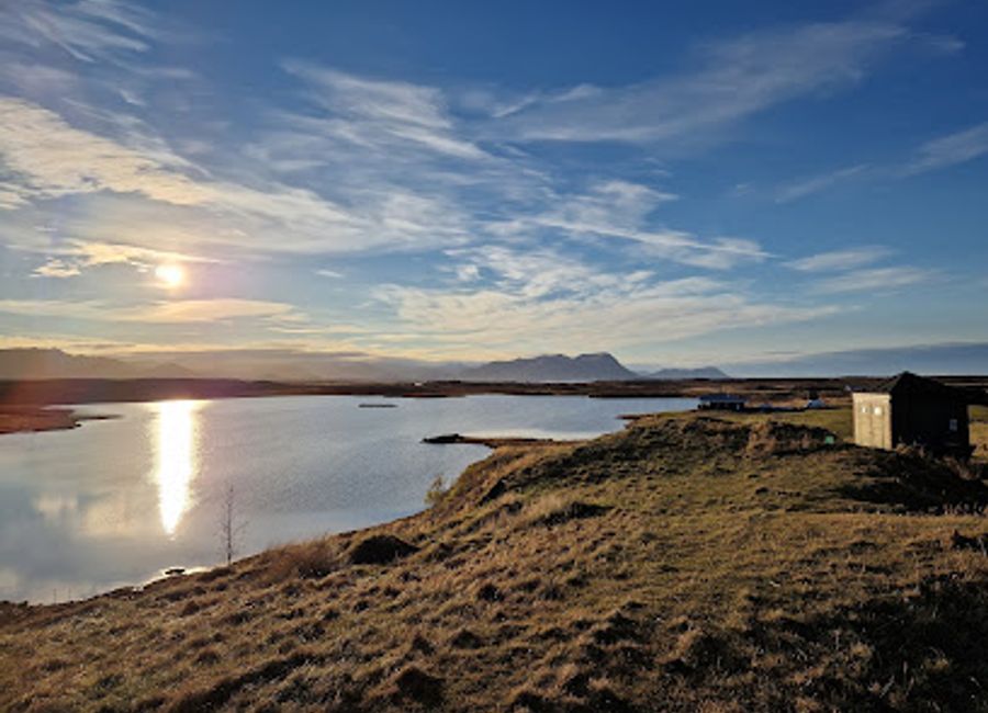Explore Helgafell, a breathtaking mountain peak in Iceland known for stunning views and hiking adventures, perfect for nature enthusiasts and families alike.