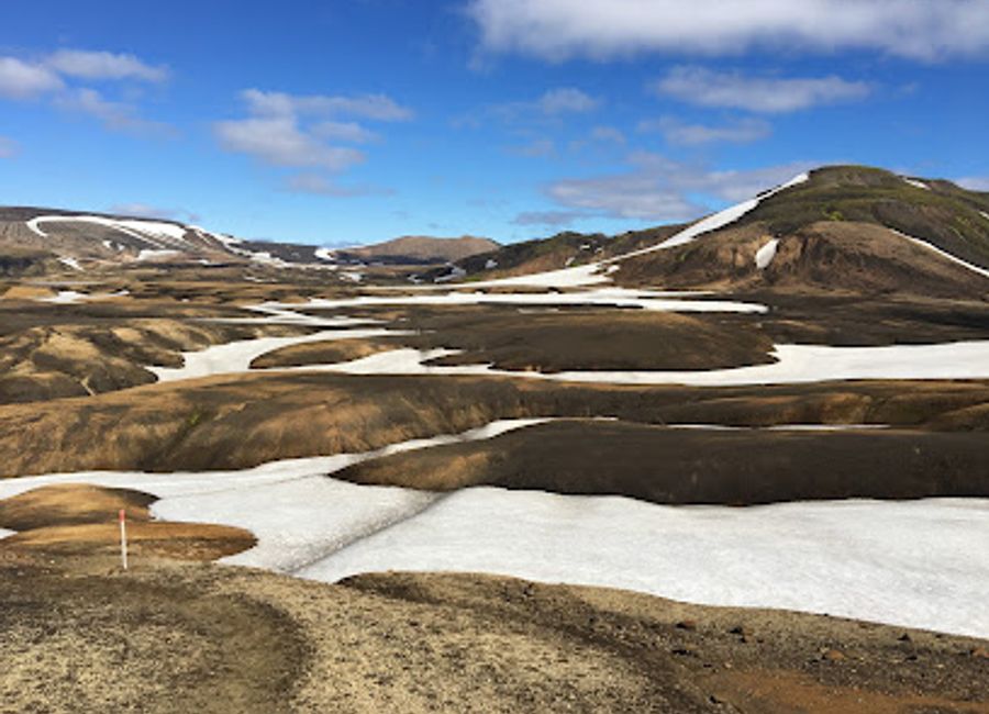Experience the stunning beauty of Hrafntinnusker, a hidden mountain peak in the Icelandic Highlands, featuring unique geological formations and breathtaking views.