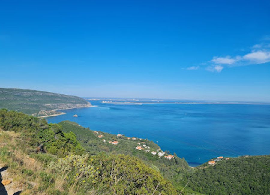 Experience the natural beauty of Parque Natural da Arrábida, a must-visit national park in Portugal with stunning landscapes and serene beaches.