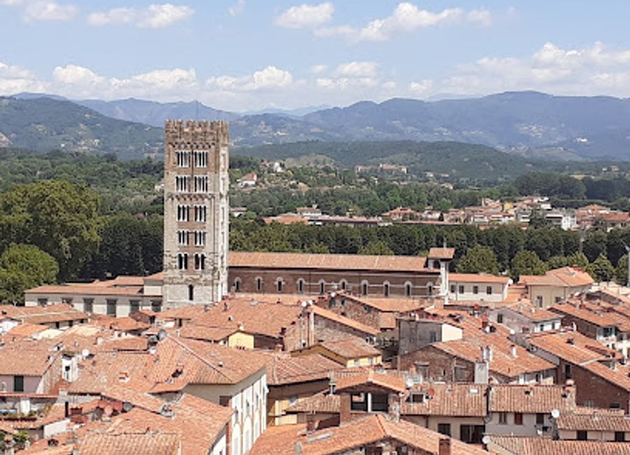 Explore the historic Clock Tower in Lucca, a stunning landmark offering breathtaking views and a glimpse into the city's rich heritage.