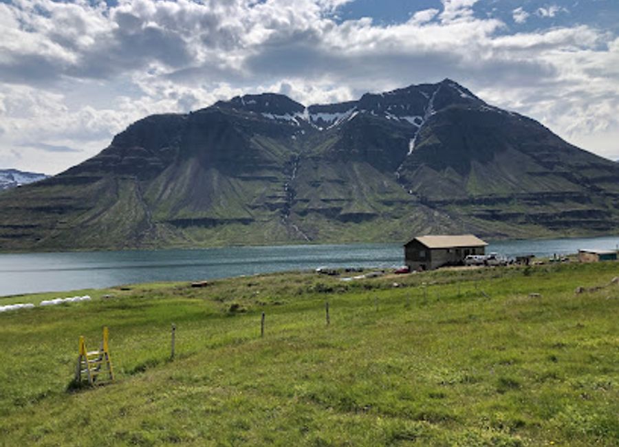 Explore Dvergasteinn, a historical landmark in Seydisfjordur, capturing the essence of Icelandic heritage amidst breathtaking natural beauty.