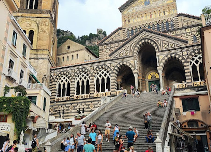 Explore the enchanting Chiostro del Paradiso in Amalfi, a 13th-century cloister showcasing stunning frescoes and peaceful gardens.