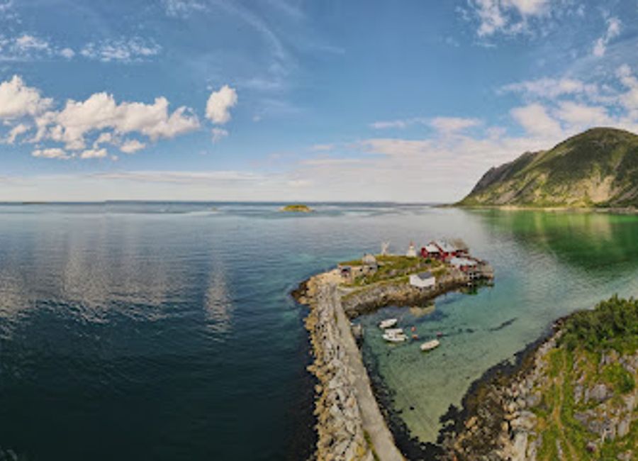 Discover the beauty and serenity of Bøstranda beach in Skaland, Norway, where stunning landscapes meet tranquil waters for the perfect getaway.