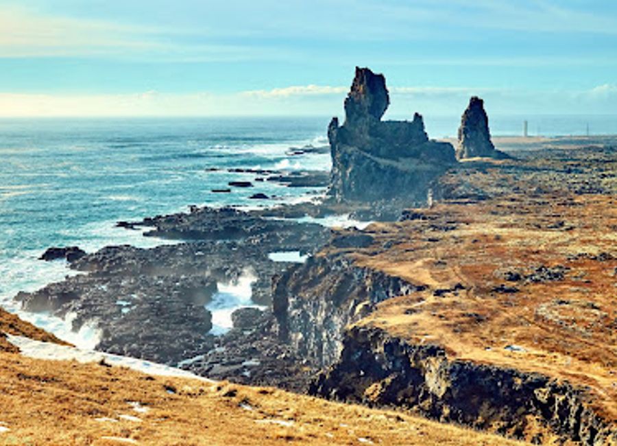 Explore the Lóndrangar View Point, an unforgettable observation deck showcasing Iceland's dramatic basalt cliffs and stunning coastal views.