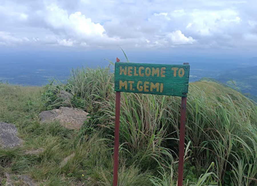 Hike to the summit of Mt. Gemi in Amedzofe for breathtaking views, historical insights, and a connection with Ghana's natural beauty and cultural heritage in the Volta Region.