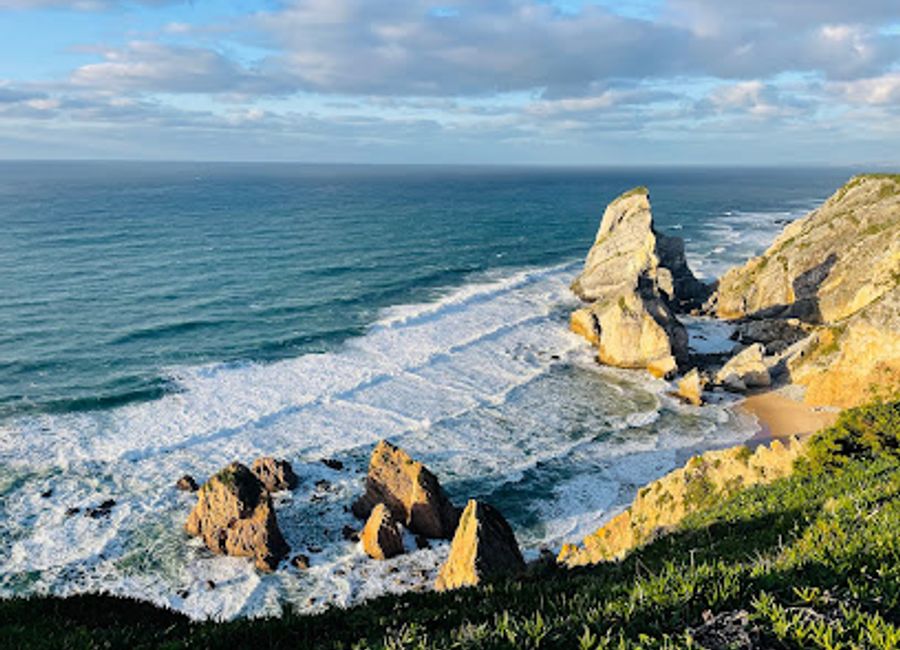 Experience the breathtaking cliffs and serene beauty of Praia da Ursa, one of Portugal's most picturesque beaches, nestled in Sintra-Cascais Natural Park.