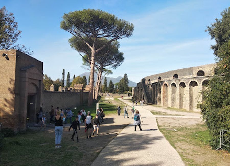Explore the Amphitheatre of Pompeii, the oldest Roman amphitheatre, where history and architecture intertwine in a breathtaking ancient setting.
