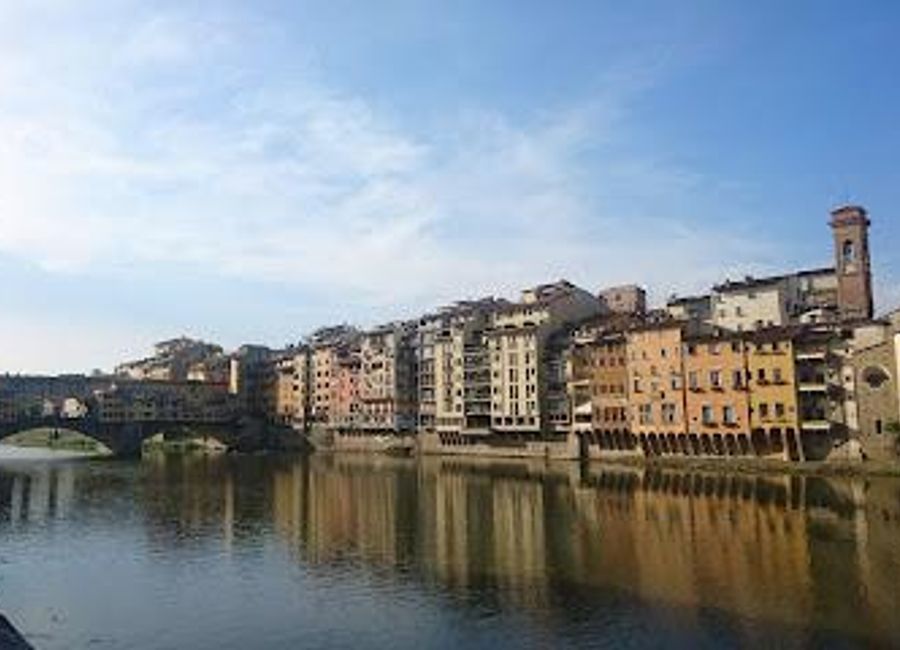 Discover the Ponte Vecchio, Florence's historic bridge lined with charming shops and breathtaking views, a true symbol of the city's rich cultural heritage.
