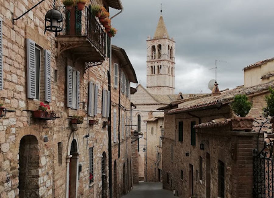 Explore the harmonious blend of modern art and historical architecture at Chiesa di Santa Maria delle Rose in Assisi, Italy.