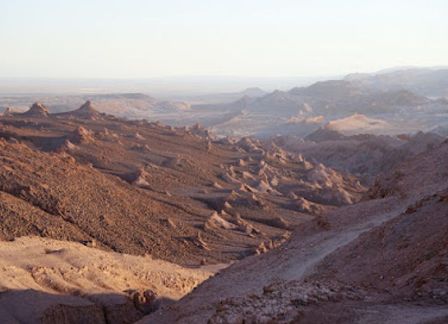 Experience the stunning beauty of Duna Mayor in Valle de la Luna, a must-visit destination in San Pedro de Atacama, Chile.