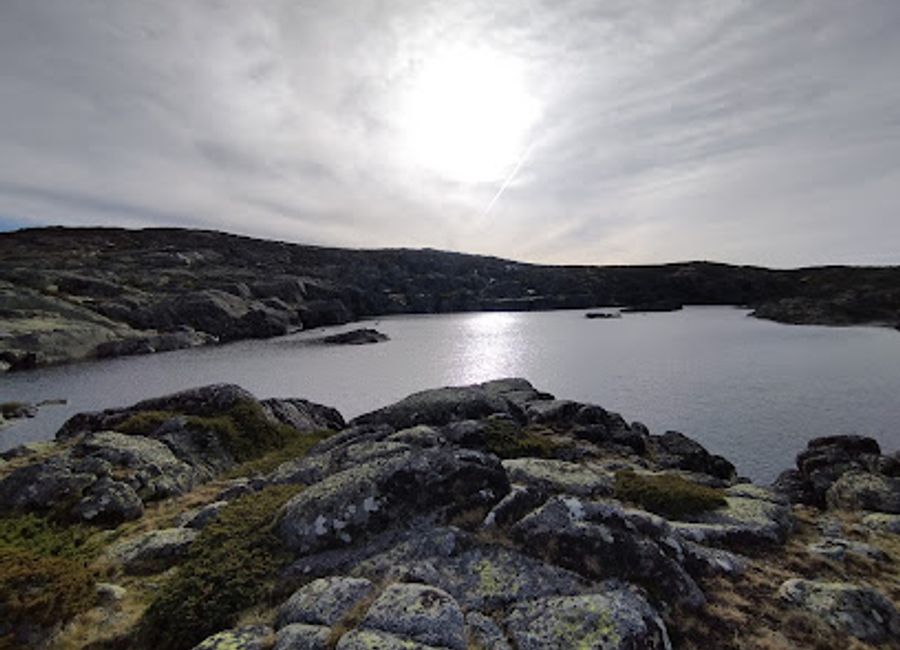Explore the serene beauty of Lagoa Serrano in Loriga, a hidden gem perfect for nature lovers and outdoor enthusiasts seeking tranquility in Portugal.