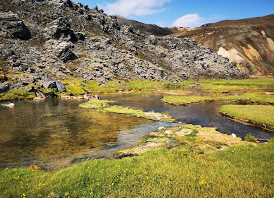 Experience the soothing thermal baths of Landmannalaugar, where nature's beauty meets relaxation in Iceland's stunning landscape.