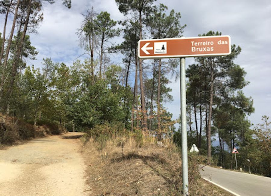 Explore the serene beauty and folklore of Terreiro das Bruxas, a captivating park in Lousã, Portugal, perfect for picnics and nature lovers.