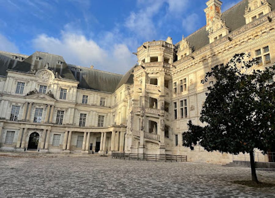 Explore the Royal Château of Blois, a stunning blend of Gothic and Renaissance architecture, steeped in history and surrounded by beautiful gardens.