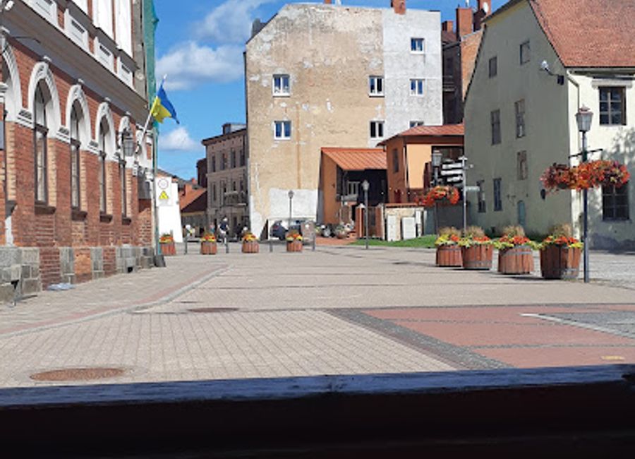 Discover the vibrant Rozu Square in Cēsis, Latvia - a cultural hub blending history, community, and breathtaking architecture.