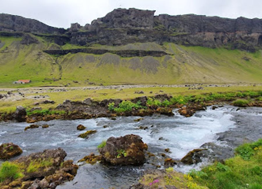 Experience the breathtaking beauty of Systrafoss Waterfall, a stunning natural attraction in Iceland perfect for hiking and photography.
