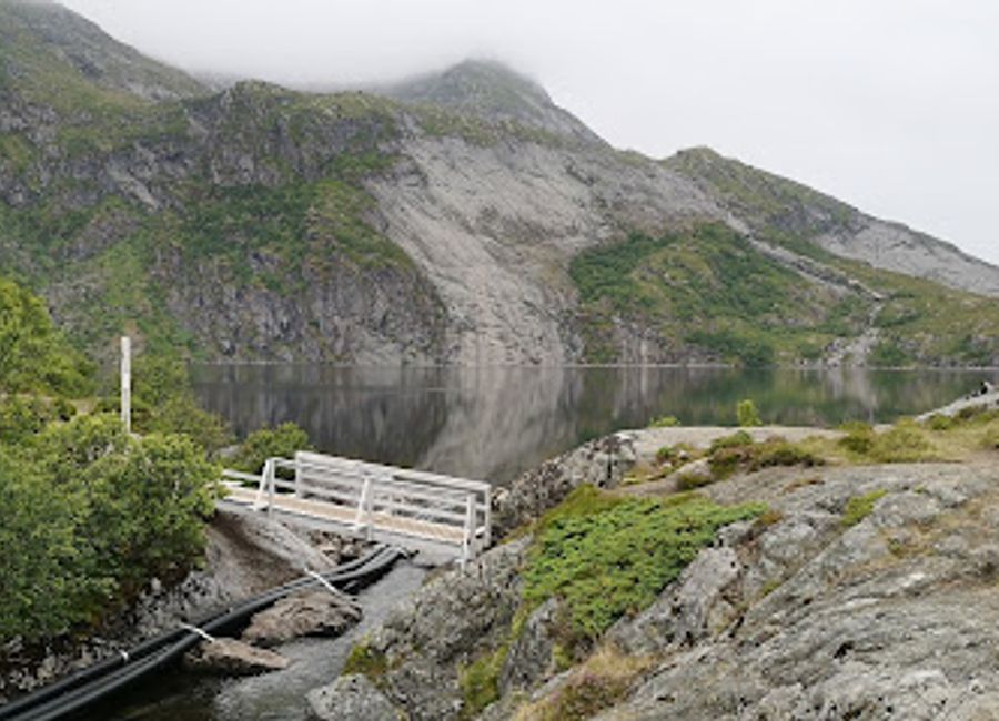 Explore the breathtaking Lofoten Waterfall in Moskenesøy, Norway - a nature lover's paradise amidst dramatic landscapes and serene beauty.