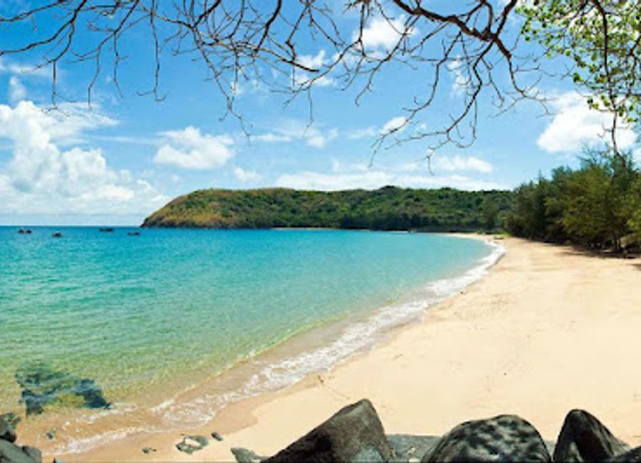 Explore the enchanting Bãi Đầm Trầu, a pristine beach on Con Dao Island, Vietnam, perfect for relaxation, adventure, and cultural exploration.