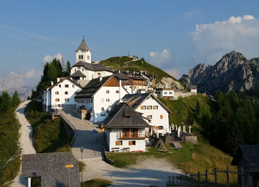 Discover the Sanctuary of Monte Lussari, a breathtaking pilgrimage site in the Julian Alps, blending spirituality with stunning mountain views.