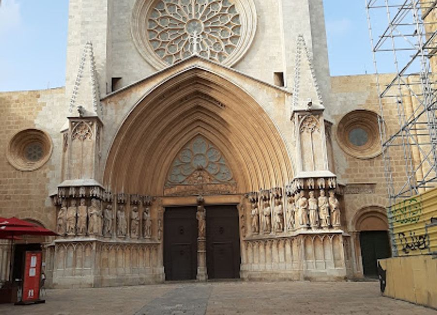Discover the stunning architecture and vibrant atmosphere of Plaça de les Cols in Tarragona, a historical landmark that encapsulates the city's rich cultural heritage.
