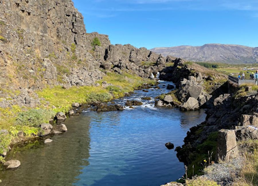 Discover the mesmerizing Drekkingarhylur waterfall in Thingvellir National Park, a UNESCO World Heritage site known for its natural beauty and rich history.