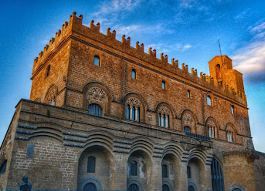 Explore the historic Palazzo Del Capitano Del Popolo, a stunning monument in Orvieto's bustling Piazza del Popolo, rich in culture and architectural beauty.