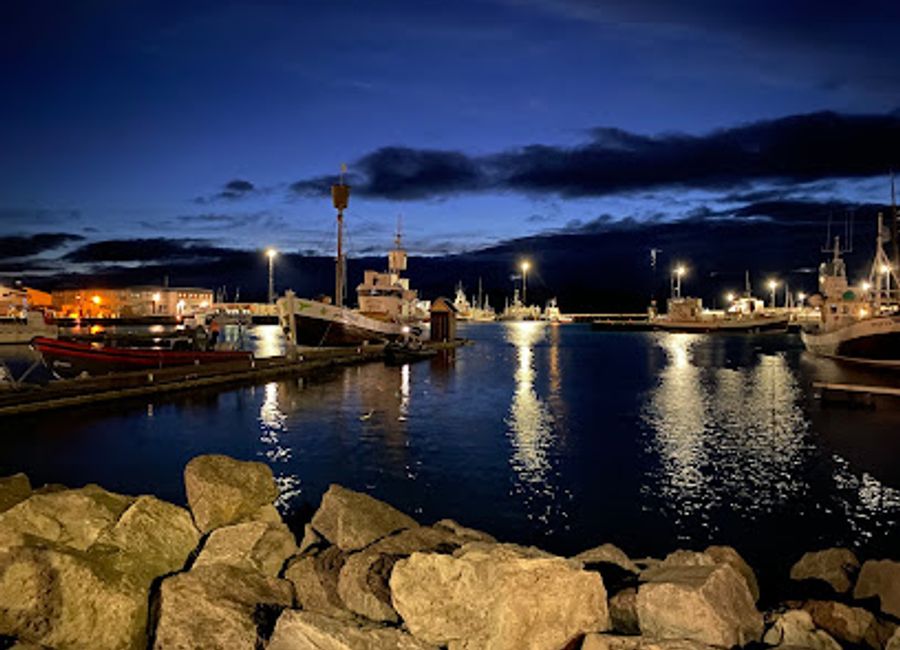 Explore Húsavík Harbor: A picturesque destination for whale watching and a gateway to Iceland's rich maritime heritage.