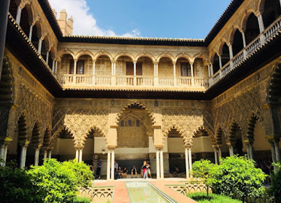 Discover the architectural beauty and rich history of Casa de Salinas, a must-visit landmark in Seville's historic district.