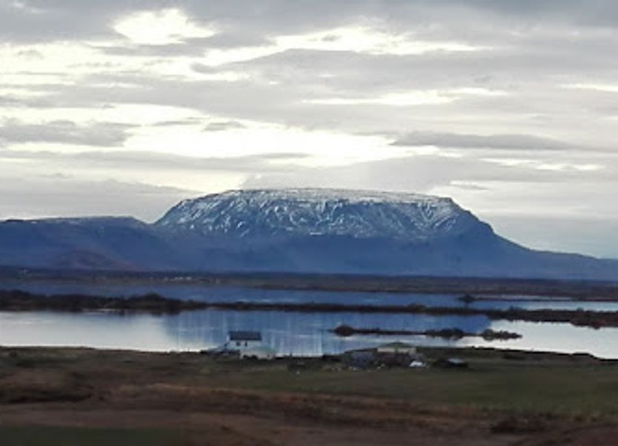 Experience the serene beauty of Stóragjá, Iceland's hidden hot spring, amidst breathtaking landscapes and geological wonders.