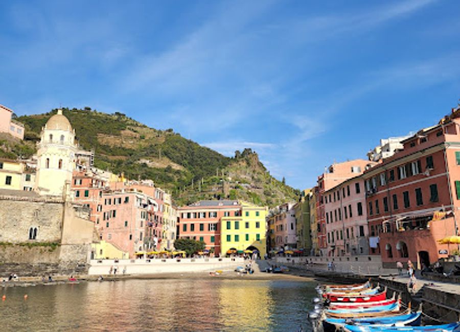 Experience the breathtaking beauty and vibrant culture of Vernazza's Port in the stunning Cinque Terre region, a must-visit destination for every traveler.