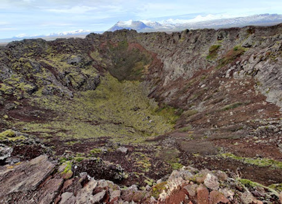 Explore the breathtaking Eldborg Crater Trailhead in West Iceland, a hiker's paradise showcasing stunning volcanic landscapes and unique geological wonders.