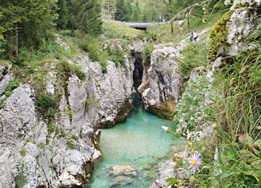 Explore the Great Soča Gorge, a stunning nature preserve in Slovenia known for its emerald waters, hiking trails, and breathtaking landscapes.