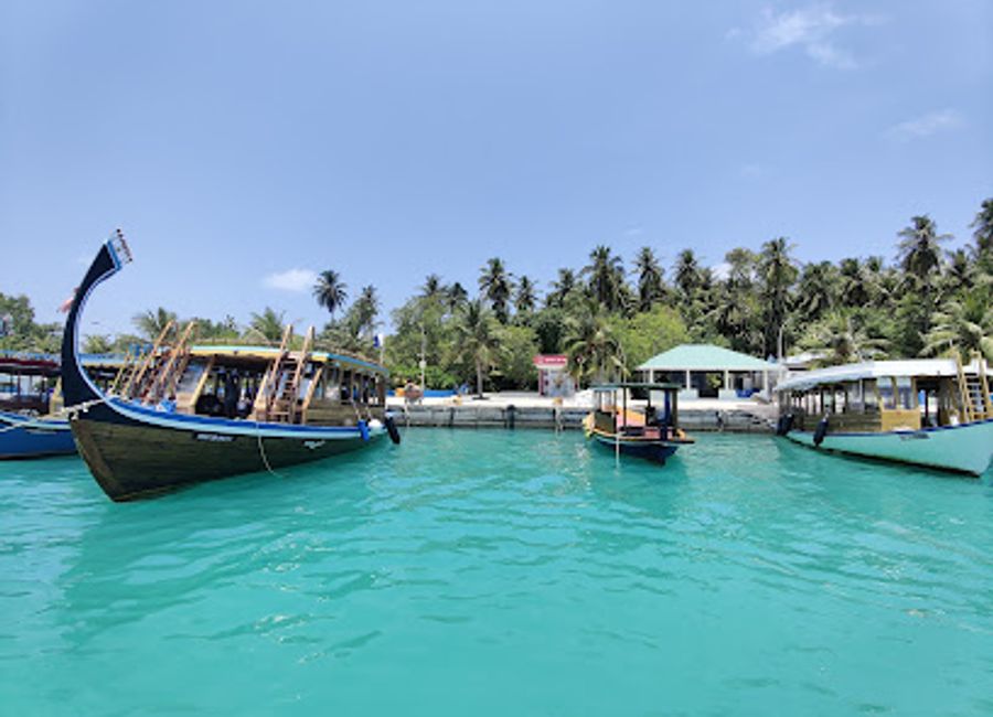 Explore the vibrant Dhigurah Harbor, a historical landmark that embodies the rich maritime culture and stunning beauty of the Maldives.