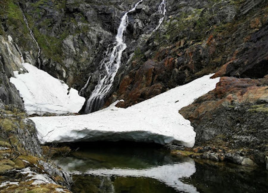 Discover the serene beauty of Skaland Waterfall, a hidden natural gem in Norway that enchants visitors with its breathtaking views and tranquil surroundings.