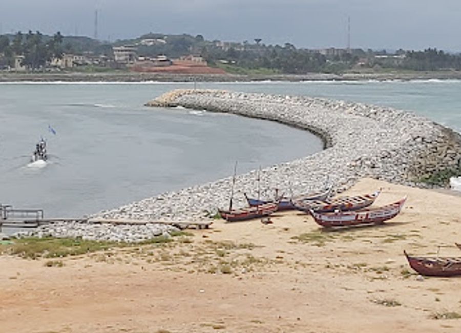 Explore the lively Elmina Fishing Harbour, where traditional fishing meets vibrant community life in picturesque Ghana.